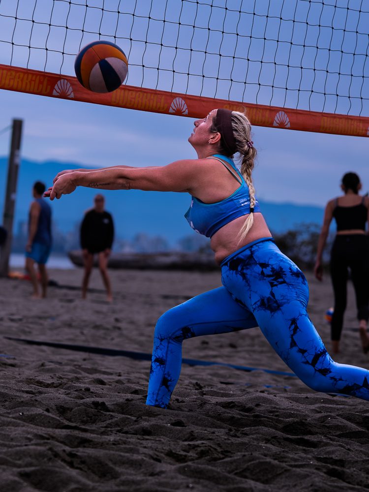 Player lunging low for a dig